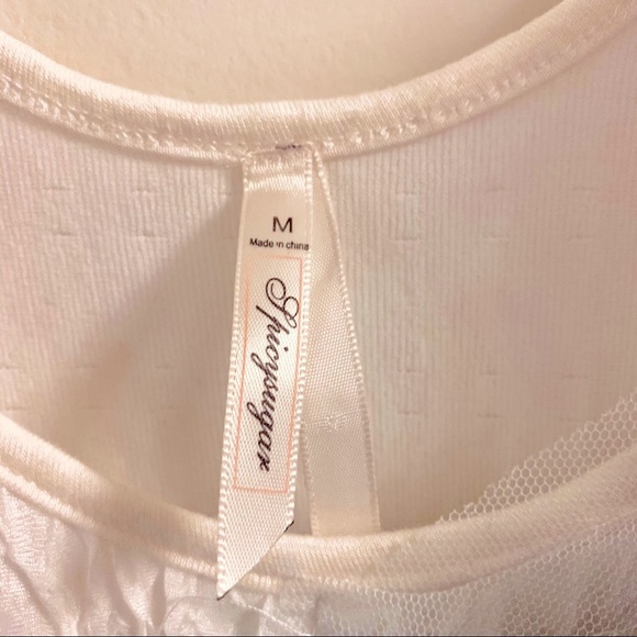 Medium tight body con black and white mini dress - Picture 3 of 4